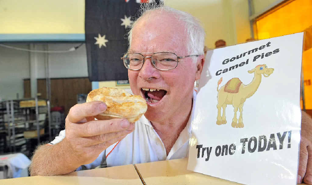 Tradewinds on Woongarra bakery owner Greg Callaghan with one of his tastebud-tingling camel pies. Tradewinds on Woongarra bakery owner Greg Callaghan with one of his tastebud-tingling camel pies.