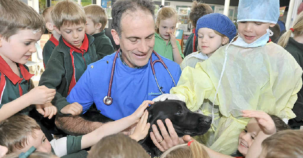 Vet Brett Stone talks to Nambour Christian College students about pet care. Vet Brett Stone talks to Nambour Christian College students about pet care.