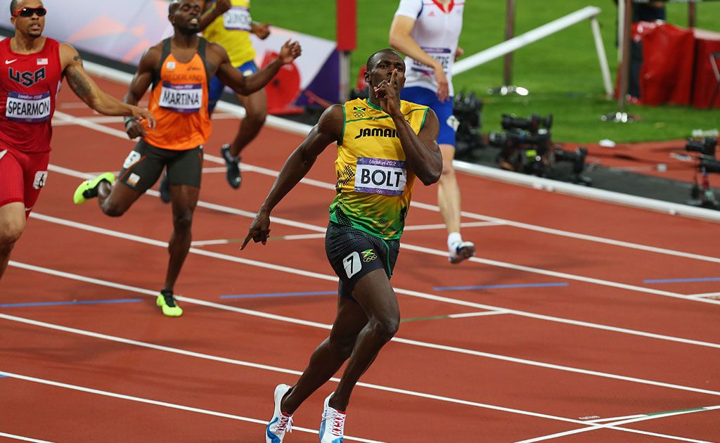 Usain Bolt of Jamaica races to the finish line to win gold ahead of Warren Weir of Jamaica in the Men's 200m Final on Day 13 of the London 2012 Olympic Games at Olympic Stadium on August 9, 2012 in London, England. Usain Bolt of Jamaica races to the finish line to win gold ahead of Warren Weir of Jamaica in the Men's 200m Final on Day 13 of the London 2012 Olympic Games at Olympic Stadium on August 9, 2012 in London, England.
