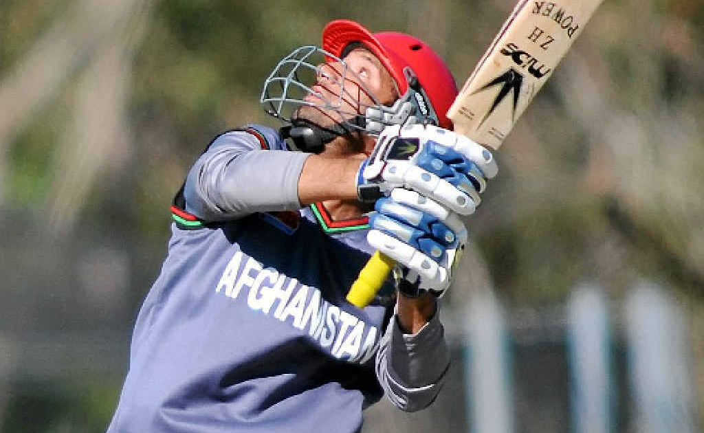 Afghanistan batsman Mohammad Javed skies the ball after scoring 20 against Pakistan yesterday. Afghanistan batsman Mohammad Javed skies the ball after scoring 20 against Pakistan yesterday.