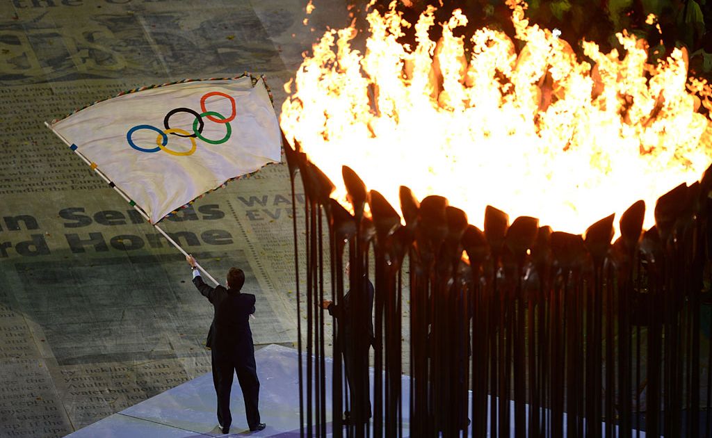 Mayor of Rio de Janeiro Eduardo Paes flies the Olympic flag during the Closing Ceremony on Day 16 of the London 2012 Olympic Games at Olympic Stadium on August 12, 2012 in London, England. Mayor of Rio de Janeiro Eduardo Paes flies the Olympic flag during the Closing Ceremony on Day 16 of the London 2012 Olympic Games at Olympic Stadium on August 12, 2012 in London, England.