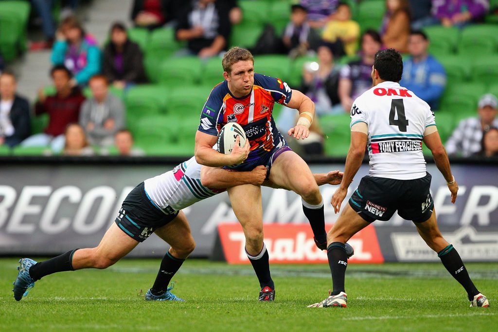 Ryan Hoffman of the Storm is tackled during the round 22 NRL match between the Melbourne Storm and the Penrith Panthers at AAMI Park on August 4, 2012 in Melbourne, Australia. Ryan Hoffman of the Storm is tackled during the round 22 NRL match between the Melbourne Storm and the Penrith Panthers at AAMI Park on August 4, 2012 in Melbourne, Australia.