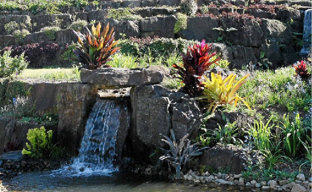 The waterfall at the bottom of the garden sold Frank Shipp on the site for the Maleny Botanic Gardens. The waterfall at the bottom of the garden sold Frank Shipp on the site for the Maleny Botanic Gardens.