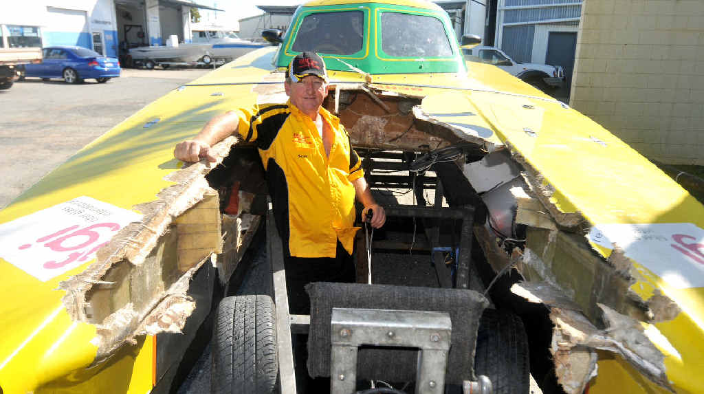 Scott Gehrman surveys the wreckage of superboats competitor BBC Digital after it crashed at speed at Mooloolaba. Scott Gehrman surveys the wreckage of superboats competitor BBC Digital after it crashed at speed at Mooloolaba.