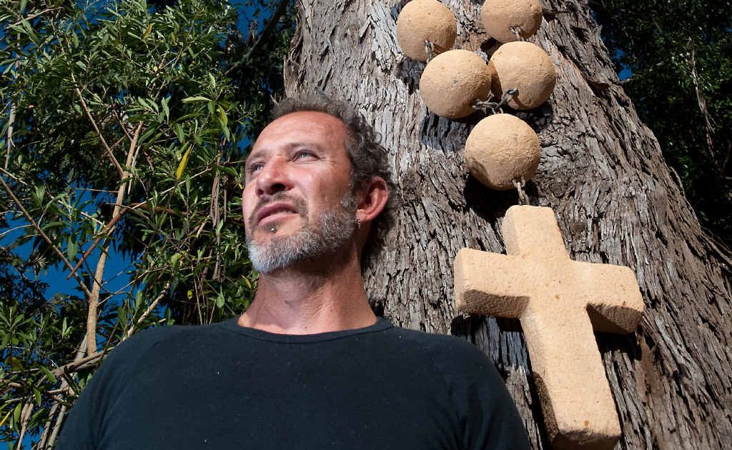 Sculptor Jeramie Scahill with Gaia’s Prayer Beads. Sculptor Jeramie Scahill with Gaia’s Prayer Beads.