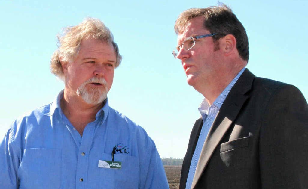 Agriculture Minister John McVeigh talks AgCollege operations with staff member Bradley Whittington. Agriculture Minister John McVeigh talks AgCollege operations with staff member Bradley Whittington.
