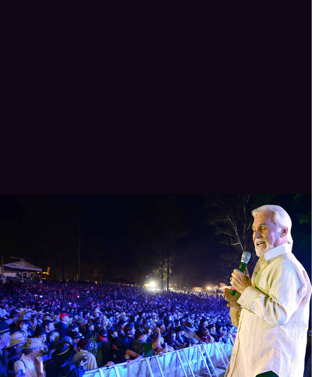 A record crowd waits for country music legend Kenny Rogers to take the stage on Sunday. A record crowd waits for country music legend Kenny Rogers to take the stage on Sunday.