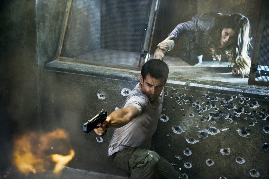 Colin Farrell and Jessica Biel in a scene from the movie Total Recall. Colin Farrell and Jessica Biel in a scene from the movie Total Recall.