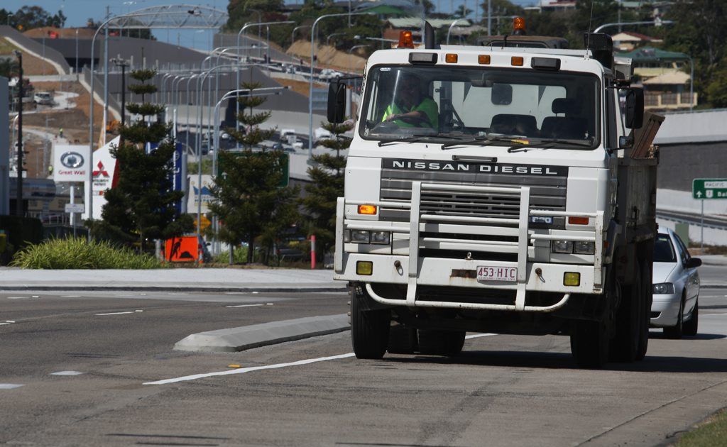 Traffic trying to merge onto Minjungbal Dr from the highway off-ramp at Tweed Heads South. Traffic trying to merge onto Minjungbal Dr from the highway off-ramp at Tweed Heads South.