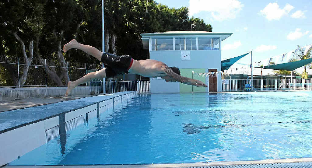 OPENING SOON: Memorial Baths worker Chris Sherring takes a dive. OPENING SOON: Memorial Baths worker Chris Sherring takes a dive.