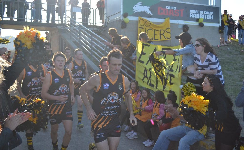 The Tigers run onto the field at the North Coast AFL grand finals. Photo Patrick Allen / The Daily Examiner The Tigers run onto the field at the North Coast AFL grand finals. Photo Patrick Allen / The Daily Examiner