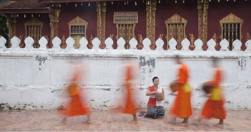 The Monks venture out of the temple to collect the offerings of the Alms. The Monks venture out of the temple to collect the offerings of the Alms.