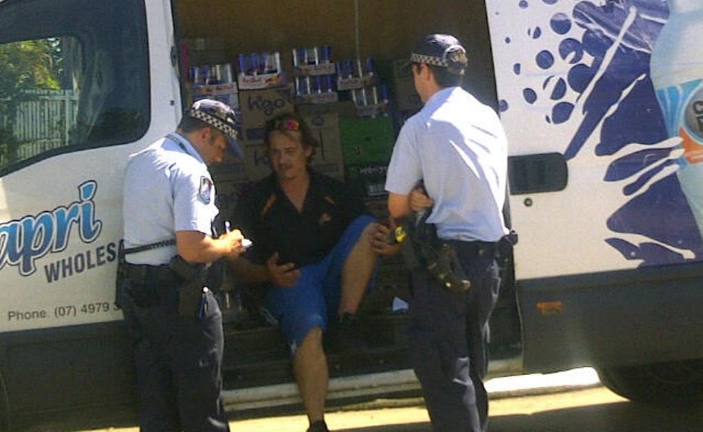 Police speak with the victim of an alleged hold-up at a Rockhampton service station. Police speak with the victim of an alleged hold-up at a Rockhampton service station.
