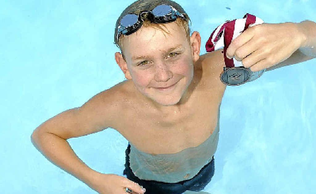 Troy Carlson came home from the state sprint titles at Chandler with a silver and a bronze medal. Troy Carlson came home from the state sprint titles at Chandler with a silver and a bronze medal.