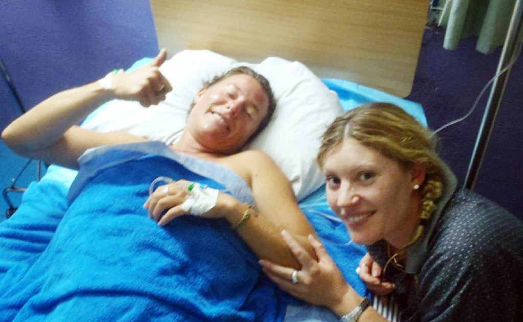 Shark attack victim Kylie Maguire in hospital in Tonga with friend Kim Hands. Her family is organising a flight to a Sydney hospital. Shark attack victim Kylie Maguire in hospital in Tonga with friend Kim Hands. Her family is organising a flight to a Sydney hospital.