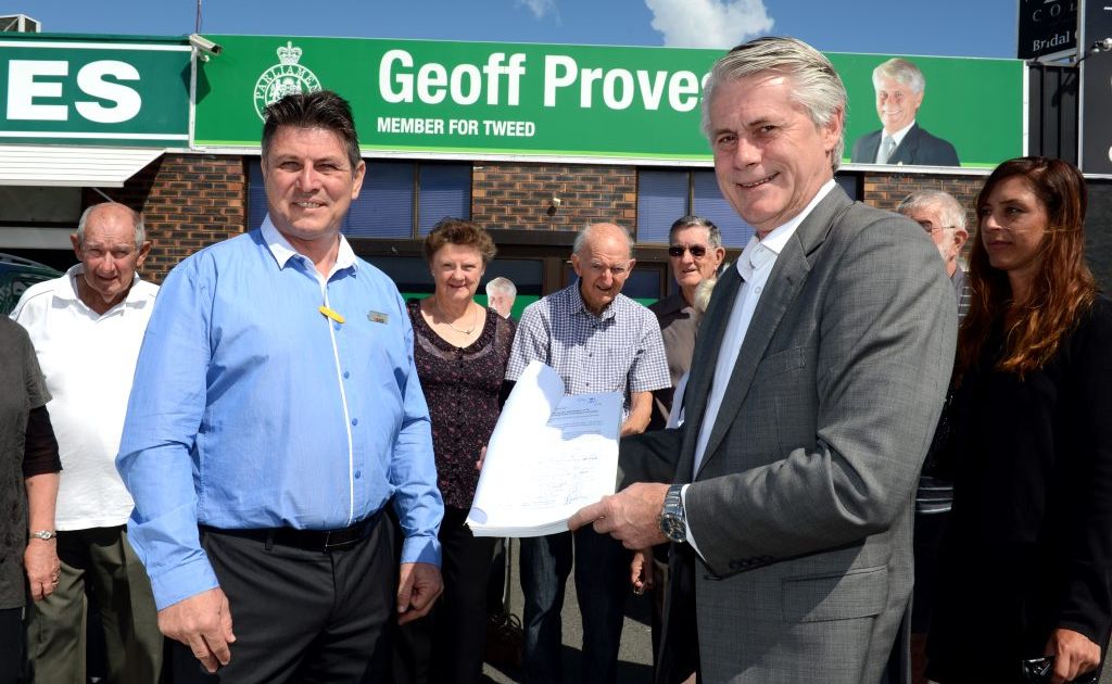 Paul McMahon and Geoff Provest with a petition signed by residents against the redevelopment of Kingscliff Police Station. Paul McMahon and Geoff Provest with a petition signed by residents against the redevelopment of Kingscliff Police Station.
