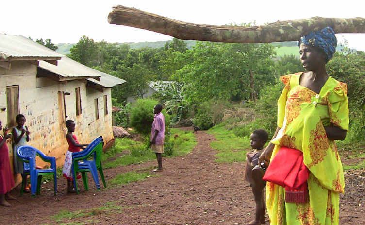 Ugandan women can carry almost anything on their heads. Ugandan women can carry almost anything on their heads.