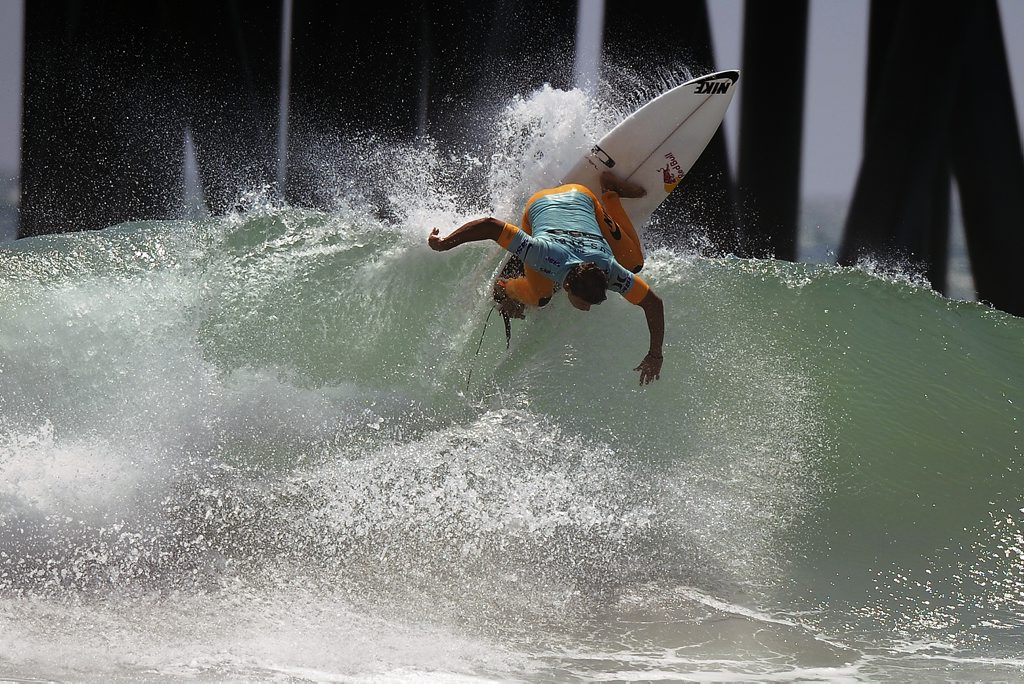 Julian Wilson in action during the US Open of Surfing event on Aug 5, 2012, in Huntington Beach, California. Julian Wilson in action during the US Open of Surfing event on Aug 5, 2012, in Huntington Beach, California.