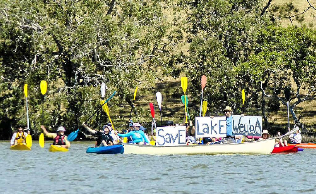The Friends of Lake Weyba make their position known last Sunday. The Friends of Lake Weyba make their position known last Sunday.