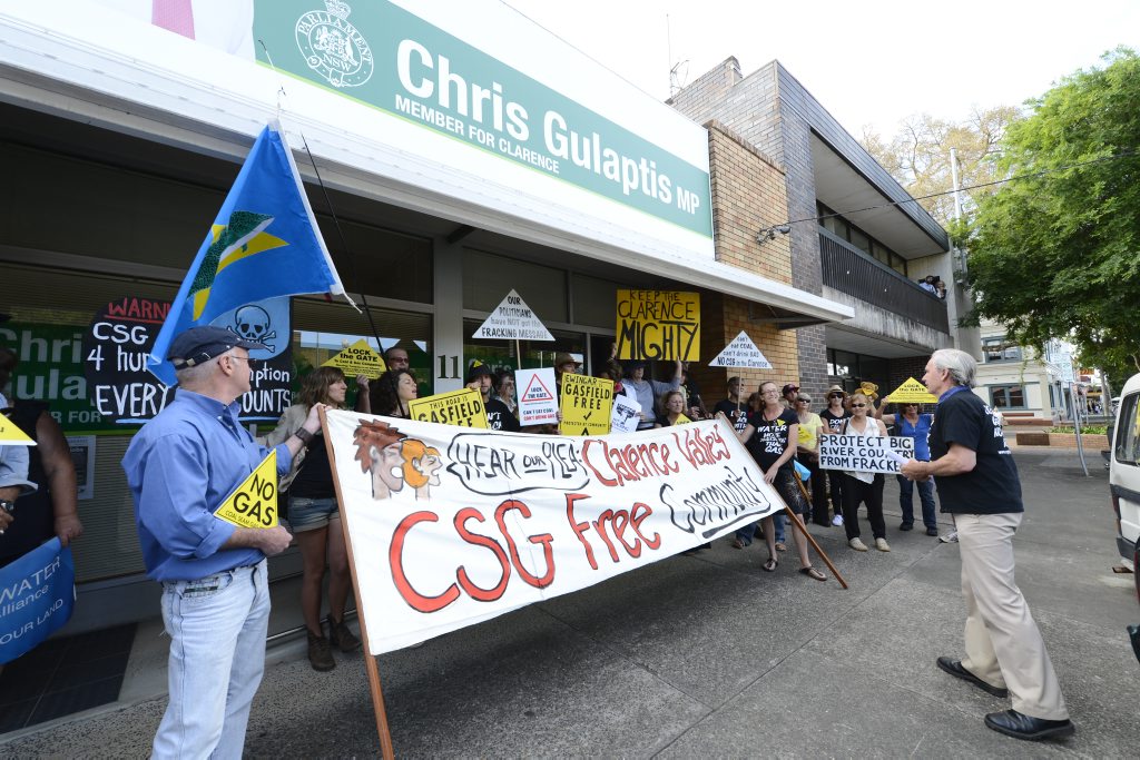 Image for sale: Anti-CSG protestors try to get a meeting with member for Clarence Chris Gulaptis. Photo: Adam Hourigan / The Daily Examiner