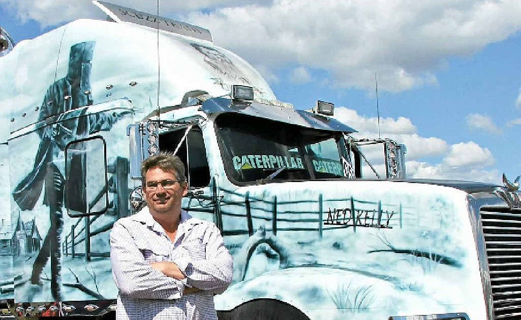 RIGGED UP: Andrew McSweeny and Ned Kelly are ready for the Brisbane Convoy for Kids. Photo: Jacob Love, J.Love Truck Photos RIGGED UP: Andrew McSweeny and Ned Kelly are ready for the Brisbane Convoy for Kids. Photo: Jacob Love, J.Love Truck Photos
