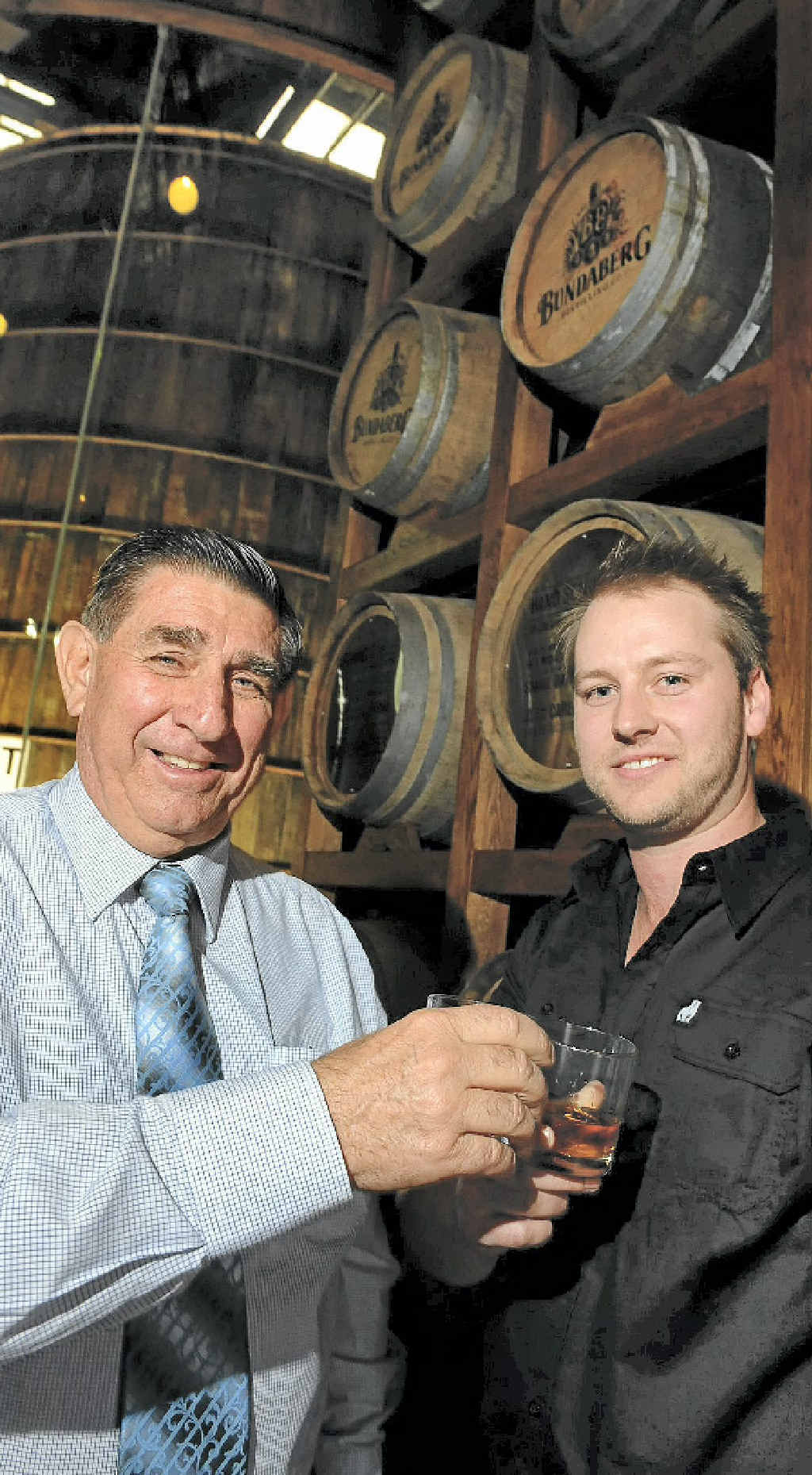Bundaberg Mayor Mal Forman and Bundaberg Distillery Company marketing manager Andrew Oughton celebrate the opening of Barrel house with a glass of the finest drop in town. Bundaberg Mayor Mal Forman and Bundaberg Distillery Company marketing manager Andrew Oughton celebrate the opening of Barrel house with a glass of the finest drop in town.