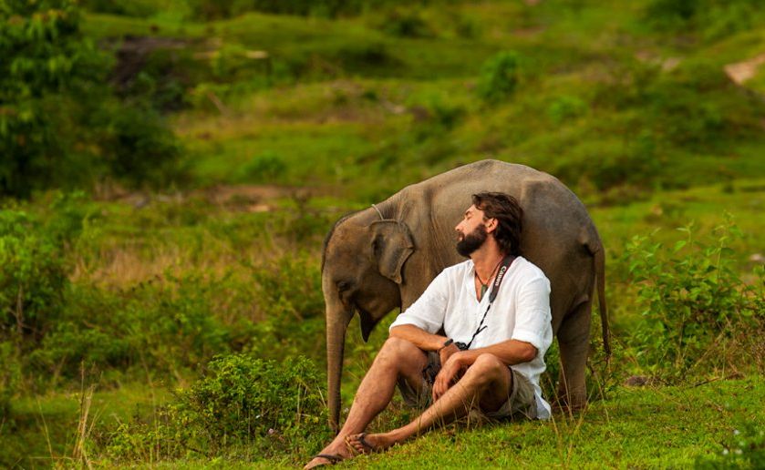 Murray Munro with Bona the baby elephant. Murray Munro with Bona the baby elephant.