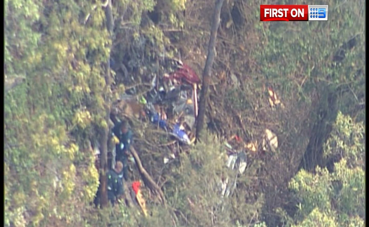 AGL rescue crew at the scene of the plane wreckage near Imbil. There were no survivors. AGL rescue crew at the scene of the plane wreckage near Imbil. There were no survivors.