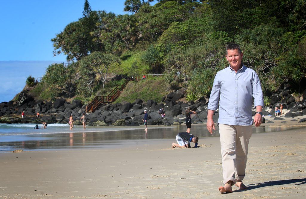 Image for sale: Tom Burlinson enjoying the beach at Greenmount.