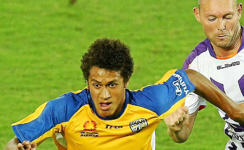 Mitch Cooper takes on the Perth Glory defence for Gold Coast United in round 24 last season. Mitch Cooper takes on the Perth Glory defence for Gold Coast United in round 24 last season.