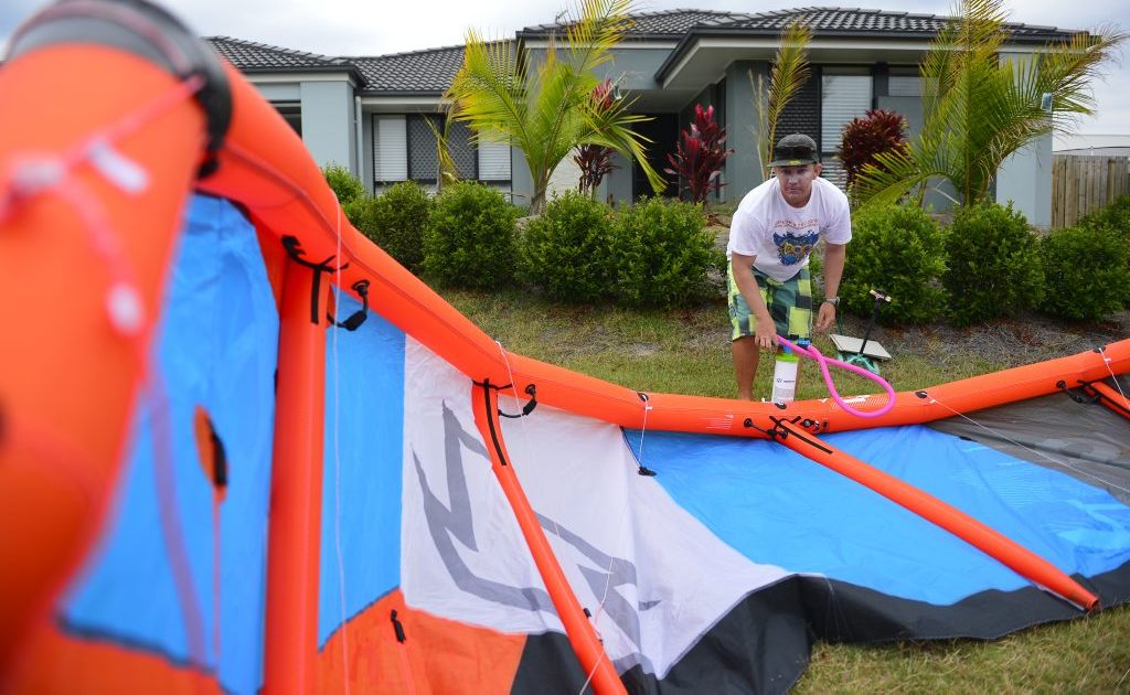 Josh Young from 'In the Loop' shows their Kite boarding kite. Photo Christopher Chan / The Observer Josh Young from 'In the Loop' shows their Kite boarding kite. Photo Christopher Chan / The Observer