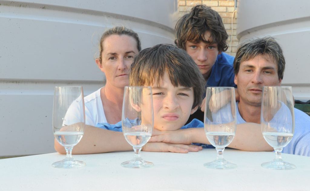 The Burton family, Julie, Tony, Paul and in the front Jayden, will be counting each drop with water levels running low. The Burton family, Julie, Tony, Paul and in the front Jayden, will be counting each drop with water levels running low.