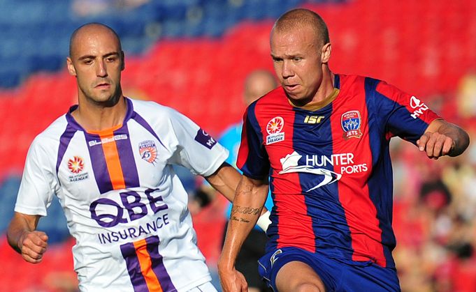 Billy Mehmet and Taylor Regan fight for the ball in an A-League Soccer clash between the Newcastle Jets and Perth Glory. Billy Mehmet and Taylor Regan fight for the ball in an A-League Soccer clash between the Newcastle Jets and Perth Glory.