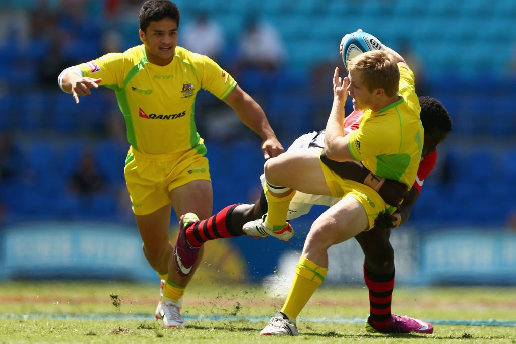 Matt Lucas of Australia is tackled during the match between Australia and Kenya on day two of the 2012 Gold Coast Sevens at Skilled Park on October 14, 2012 in Gold Coast, Australia. Matt Lucas of Australia is tackled during the match between Australia and Kenya on day two of the 2012 Gold Coast Sevens at Skilled Park on October 14, 2012 in Gold Coast, Australia.