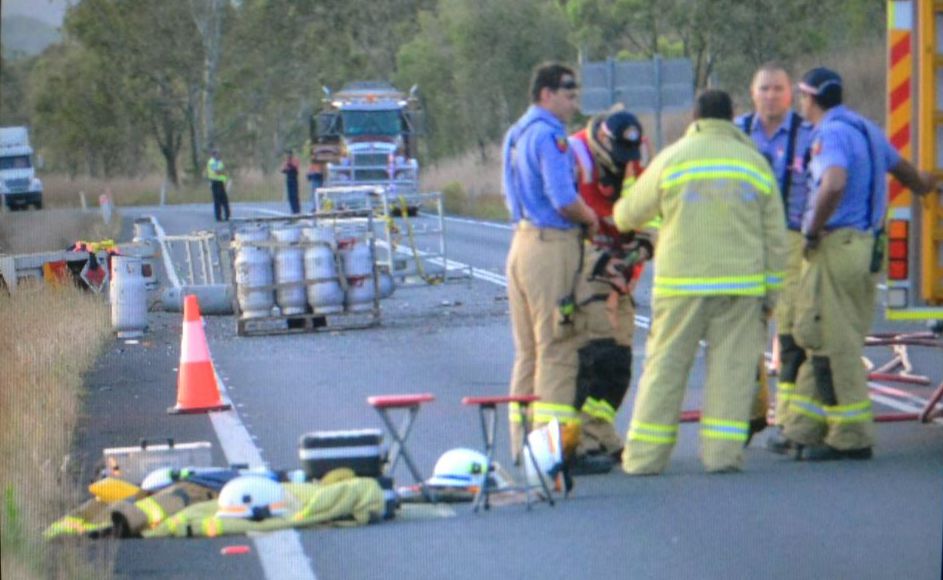 Port Curtis Way was blocked yesterday afternoon after a truck carrying gas cylinders rolled and the cylinders were strewn across the road. Port Curtis Way was blocked yesterday afternoon after a truck carrying gas cylinders rolled and the cylinders were strewn across the road.