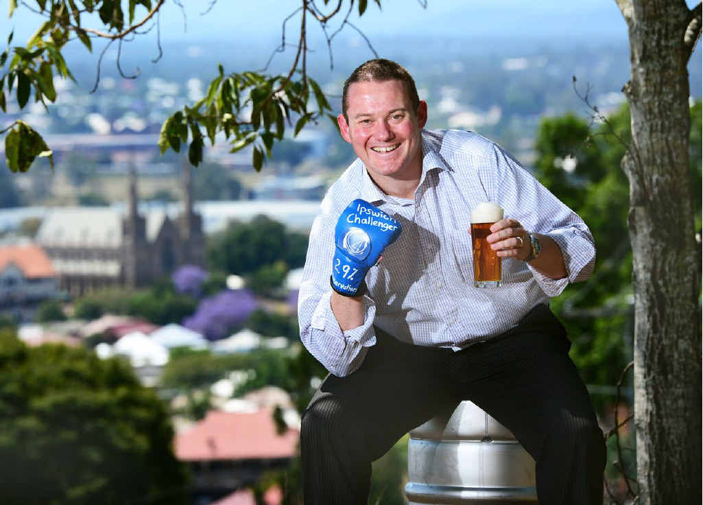 Local brewer Wade Curtis with his new mid-strength beer the Ipswich Challenger. Local brewer Wade Curtis with his new mid-strength beer the Ipswich Challenger.