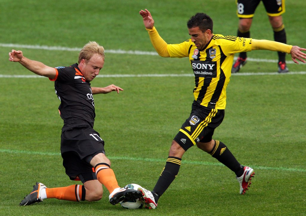 Mitch Nichols of the Roar and Manny Muscat of the Phoenix compete for the ball during the round three A-League match between the Wellington Phoenix and Brisbane Roar at Westpac Stadium on October 21, 2012 in Wellington, New Zealand. Mitch Nichols of the Roar and Manny Muscat of the Phoenix compete for the ball during the round three A-League match between the Wellington Phoenix and Brisbane Roar at Westpac Stadium on October 21, 2012 in Wellington, New Zealand.