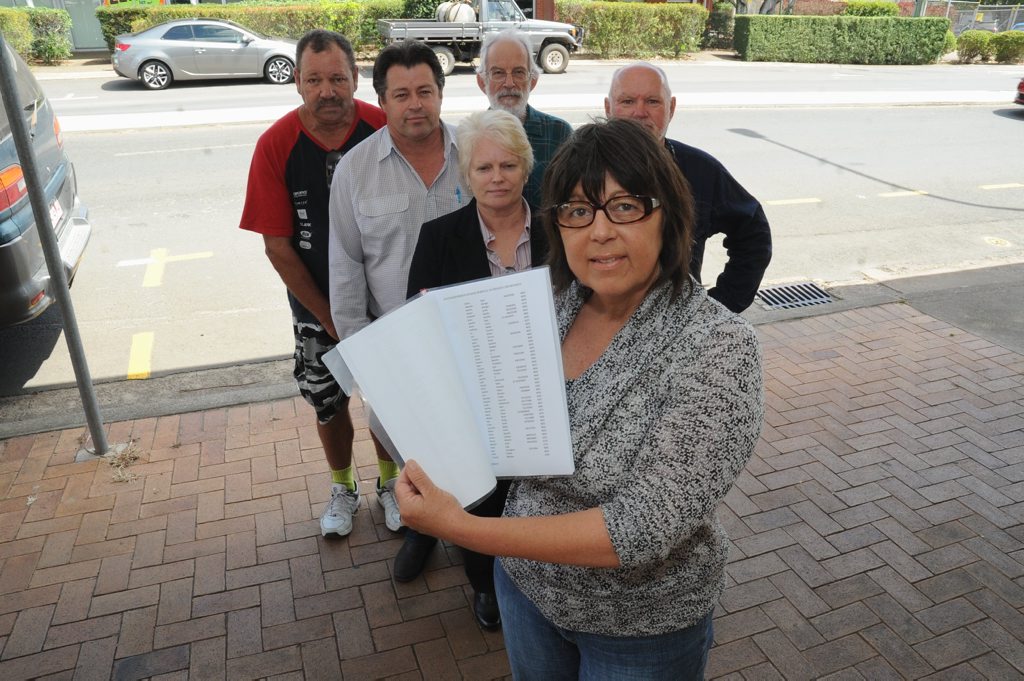 Suellen Sellwood hands in a petition to save the Maryborough Base Hospital Pathology Lab.