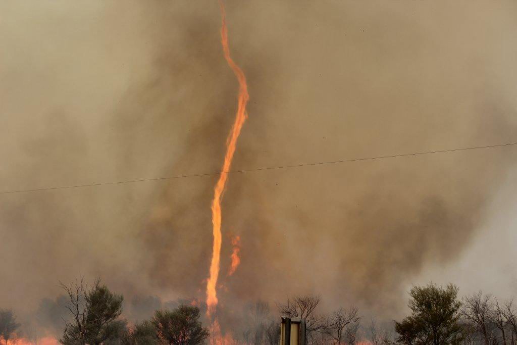 Fire is sucked into the air in this fire twister captured at Thargomindah in south-west Queensland. Fire is sucked into the air in this fire twister captured at Thargomindah in south-west Queensland.