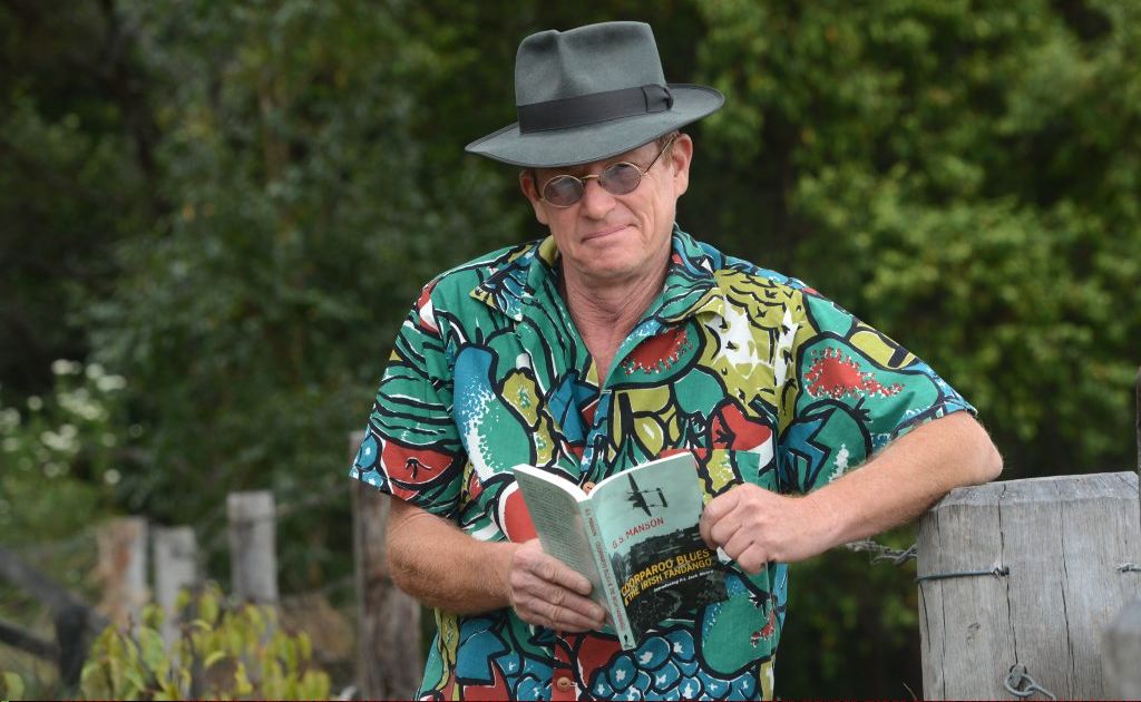 Greg Manson with his new book. Greg Manson with his new book.