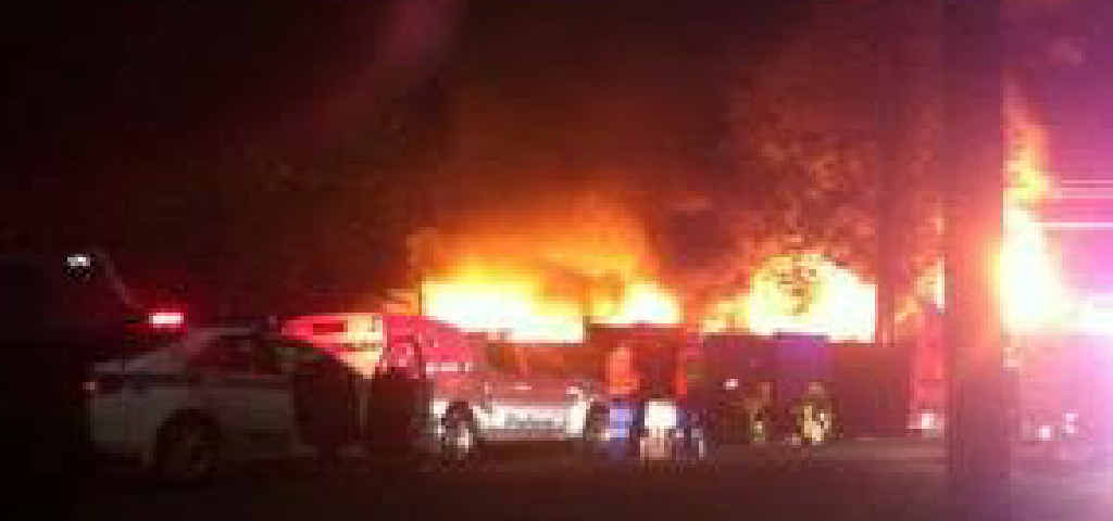 FLAMING INFERNO: A photo supplied by a neighbour showing the fire destroying the house in Newbridge Street, South Lismore. FLAMING INFERNO: A photo supplied by a neighbour showing the fire destroying the house in Newbridge Street, South Lismore.