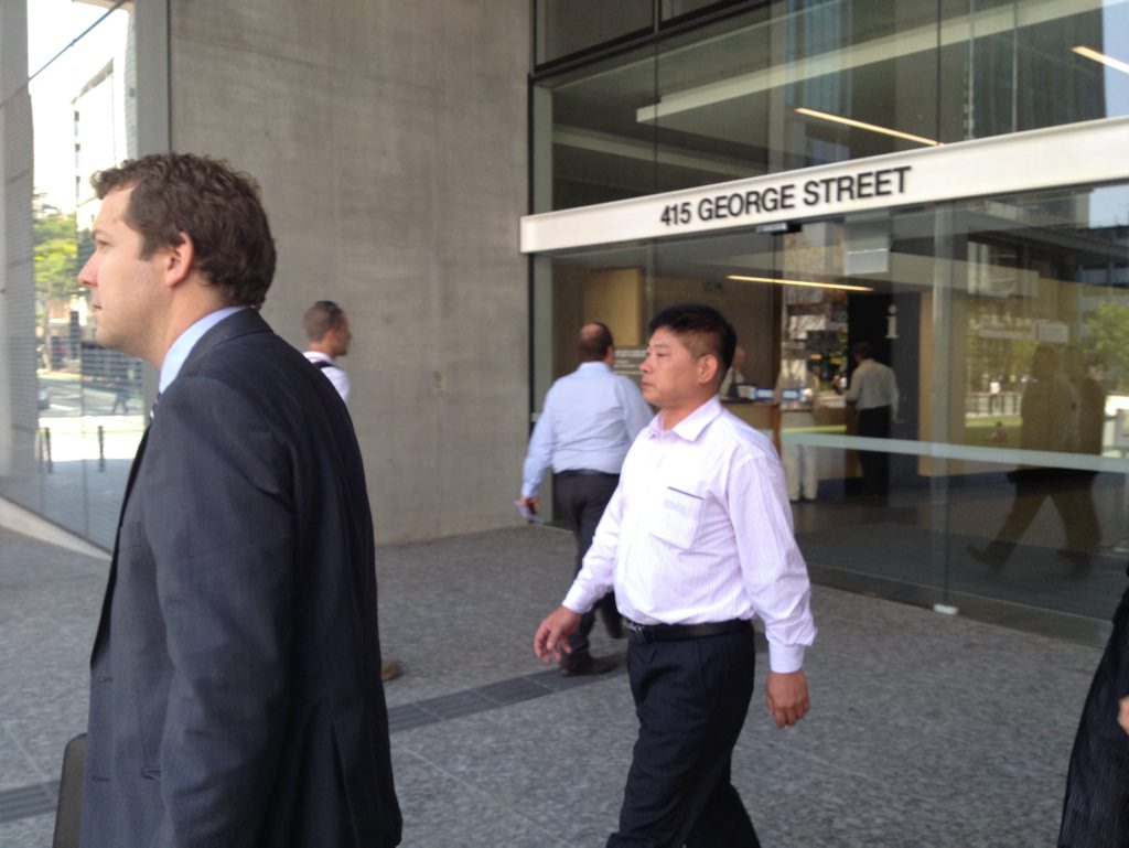 Chinese man Xuegang Wang, who was in charge of the ship Shen Neng 1 when it run around on the Great Barrier Reef off Central Queensland, at Brisbane District Court. Chinese man Xuegang Wang, who was in charge of the ship Shen Neng 1 when it run around on the Great Barrier Reef off Central Queensland, at Brisbane District Court.