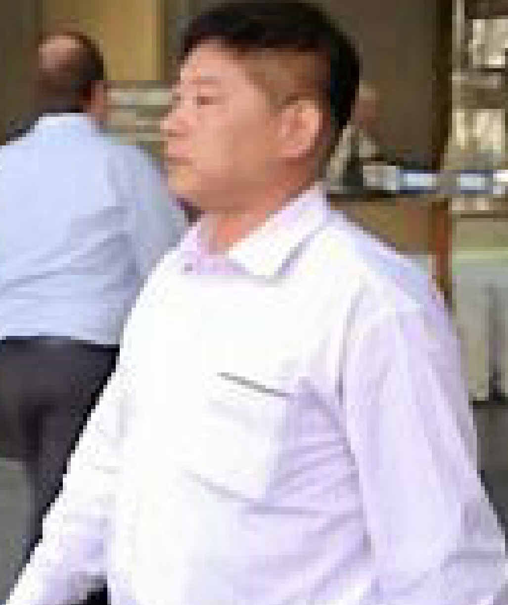 GUILTY: Xuegang Wang at court yesterday. GUILTY: Xuegang Wang at court yesterday.