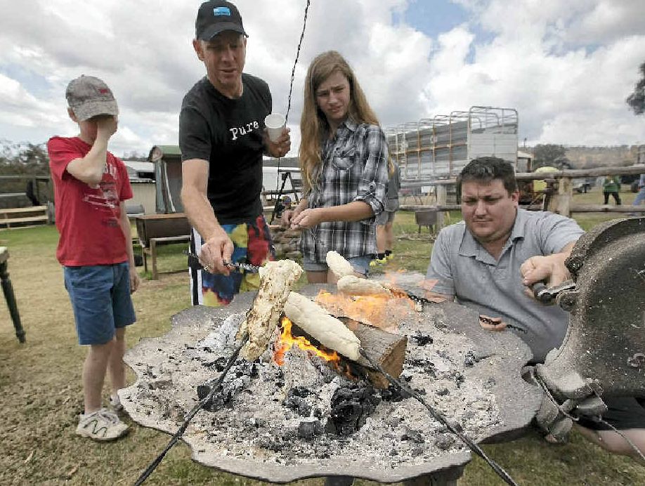 The kids can make their own damper after milking the cows. The kids can make their own damper after milking the cows.