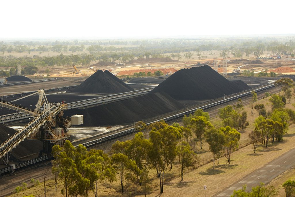The stacker reclaimer and stockpiles at Kestrel Mine, with extension work visible in the distance. The stacker reclaimer and stockpiles at Kestrel Mine, with extension work visible in the distance.