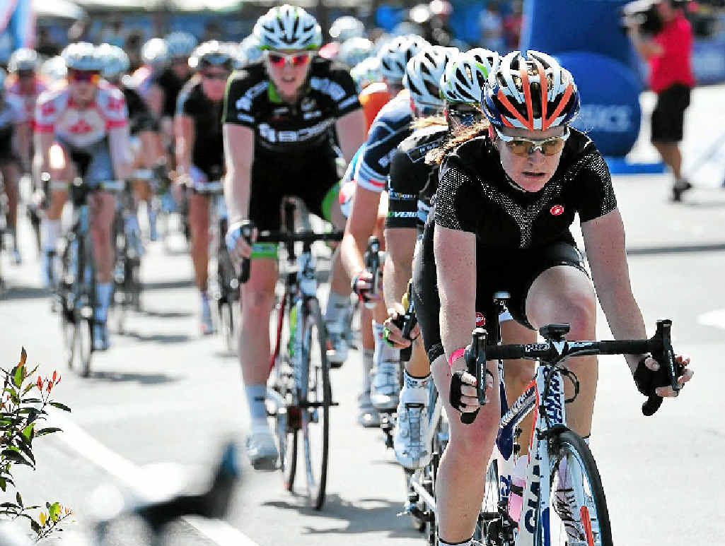 QUICK TO POUNCE: Lauren Kitchen heads for victory in the Cycling Grand Prix at Noosa yesterday.