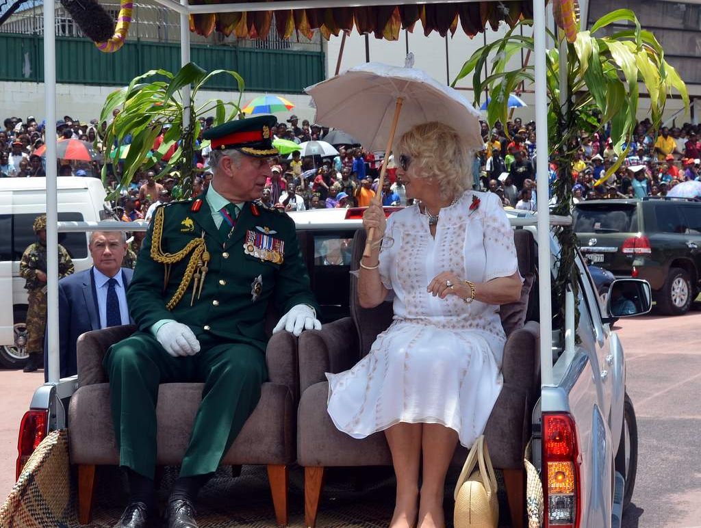 Prince Charles and Camilla on the back of a ute in PNG. It's a fair bet they won't arrive in similar style at the Melbourne Cup. Prince Charles and Camilla on the back of a ute in PNG. It's a fair bet they won't arrive in similar style at the Melbourne Cup.