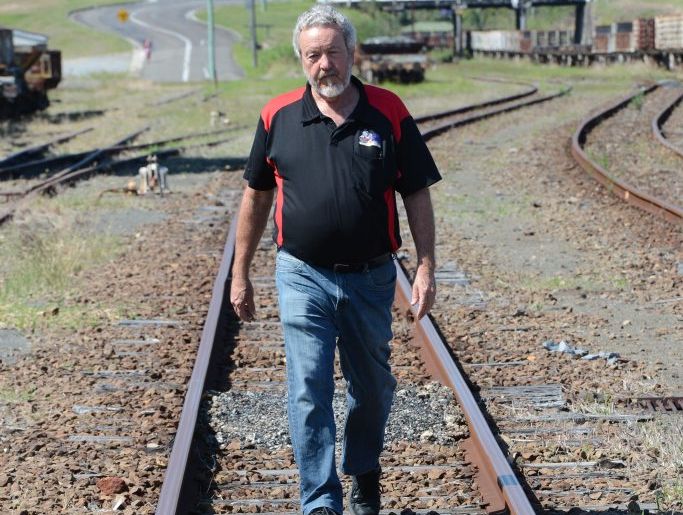 Jim Walker walks the track that needs funds so the Rattler can run again. 