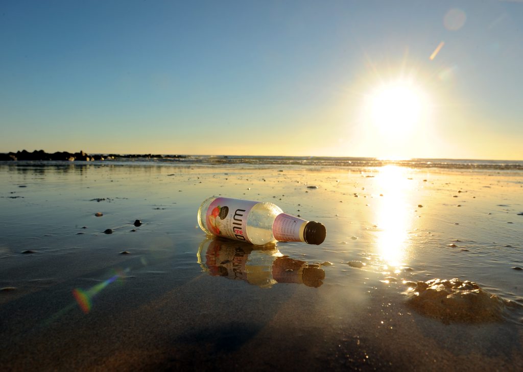 Empty bottle on Bargara Beach. Photo: Max Fleet / NewsMail Empty bottle on Bargara Beach. Photo: Max Fleet / NewsMail