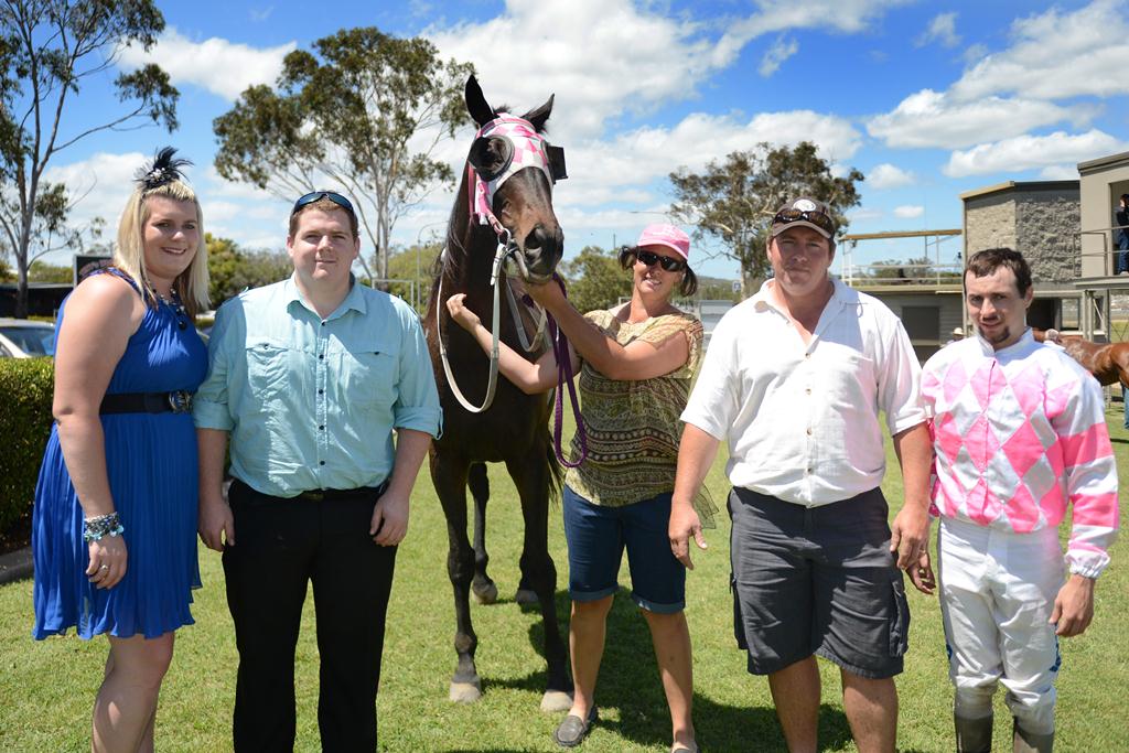 Owner Gary Popp and jockey Dale Evans with two-time winner Ranger Hill and friends. Owner Gary Popp and jockey Dale Evans with two-time winner Ranger Hill and friends.